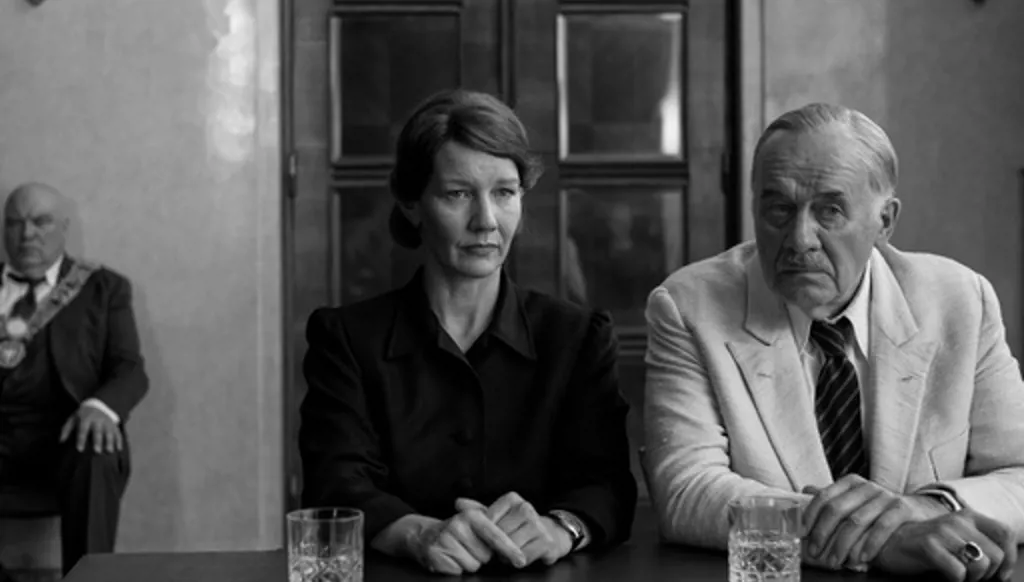 This image released by Mubi shows Sandra Hüller, left, and Hanns Zischler in a scene from "Fatherland." (Agata Grzybowska/Mubi via AP)