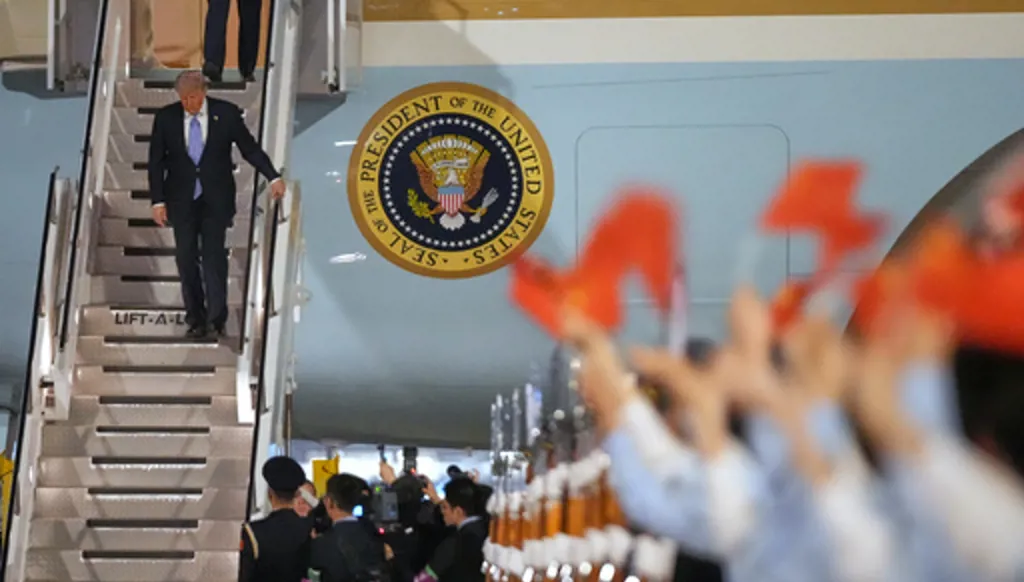 President Donald Trump arrives on Air Force One, Wednesday, May 13, 2026, at Beijing Capital International Airport in Beijing. (AP Photo/Mark Schiefelbein)