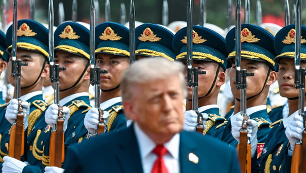 President Donald Trump reviews troops at the Great Hall of the People, Thursday, May 14, 2026, in Beijing. (Kenny Holston/The New York Times via AP, Pool)