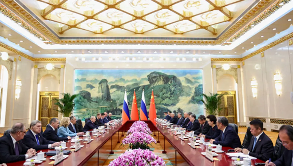Russian President Vladimir Putin and Chinese President Xi Jinping attend a bilateral meeting at the Great Hall of the People, in Beijing, China, on Wednesday, May 20, 2026. (Alexander Kazakov, Sputnik, Kremlin Pool Photo via AP)