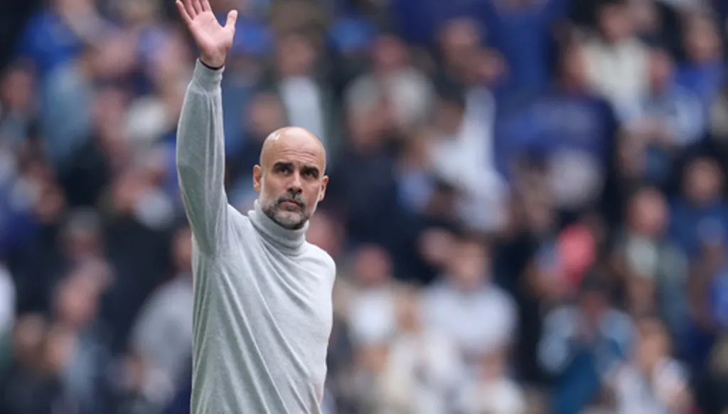 Manchester City's head coach Pep Guardiola greets fans before the English FA Cup final soccer match between Chelsea and Manchester City in London, Saturday, May 16, 2026. (AP Photo/Richard Pelham)