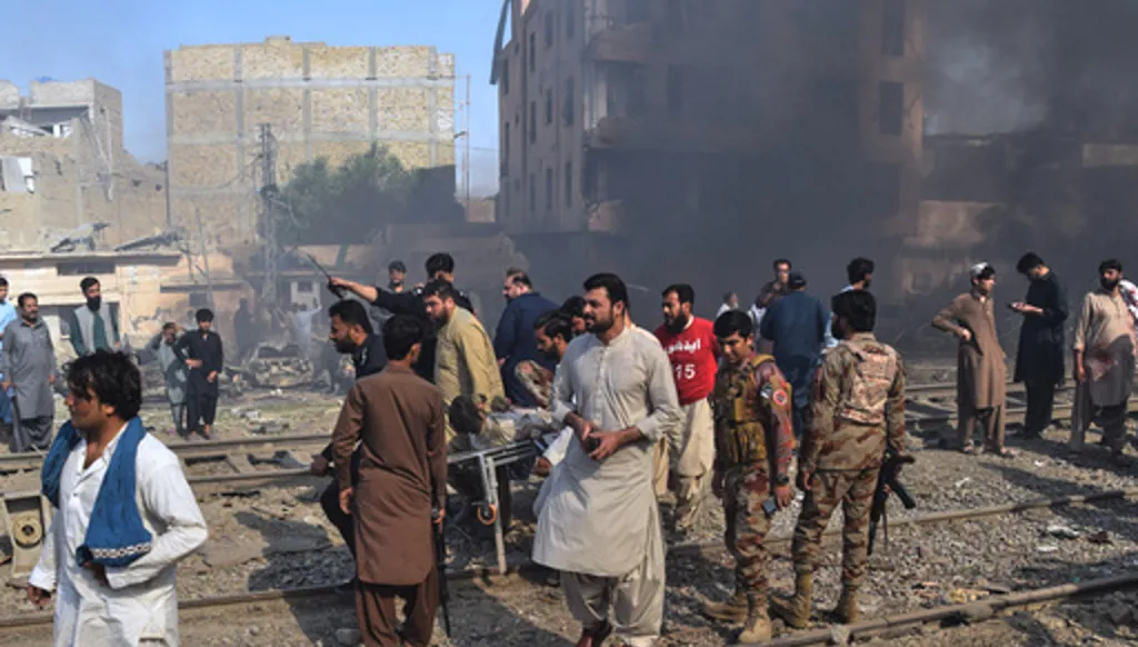 Paramilitary soldiers and volunteers transport an injured victim at the site of bomb explosion, in Quetta, Pakistan, Sunday, May 24, 2026. (AP Photo/Arshad Butt)