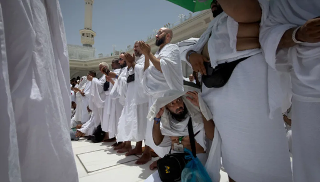 Muslim pilgrims pray in front of the Kaaba, the cubic building at the Grand Mosque, during the annual Hajj pilgrimage in the Muslim holy city of Mecca, Saudi Arabia, Thursday, May 21, 2026. (AP Photo/Altaf Qadri)