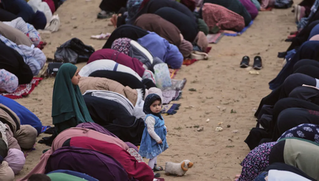 Muslims worshipers offer Eid al-Adha prayers in Gaza City Wednesday, May 27, 2026. (AP Photo/Jehad Alshrafi)