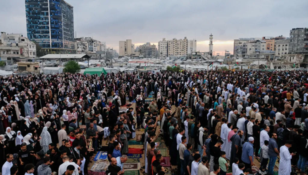 Muslims worshipers gather for Eid al-Adha prayers in Gaza City Wednesday, May 27, 2026. (AP Photo/Jehad Alshrafi)