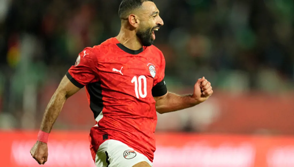 FILE - Egypt's Mohamed Salah celebrates after scoring his side's third goal during the Africa Cup of Nations round of 16 soccer match between Egypt and Benin in Agadir, Morocco, Monday, Jan. 5, 2026. (AP Photo/Mosa'ab Elshamy, File)