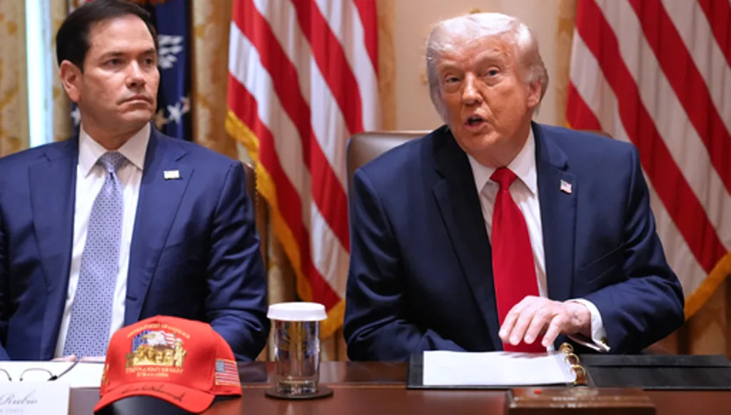 President Donald Trump, next to Secretary of State Marco Rubio, speaks during a Cabinet meeting at the White House, Wednesday, May 27, 2026, in Washington. (AP Photo/Jacquelyn Martin)