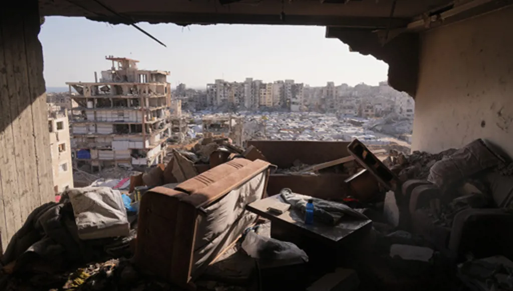 A damaged apartment in a residential building is seen after an overnight Israeli strike in Gaza City, Thursday, June 4, 2026. (AP Photo/Jehad Alshrafi)