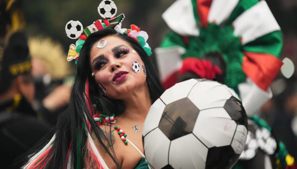 A dancer performs along Reforma Avenue in Mexico City, Saturday, June 6, 2026 ahead of the FIFA World Cup. (AP Photo/Moises Castillo)