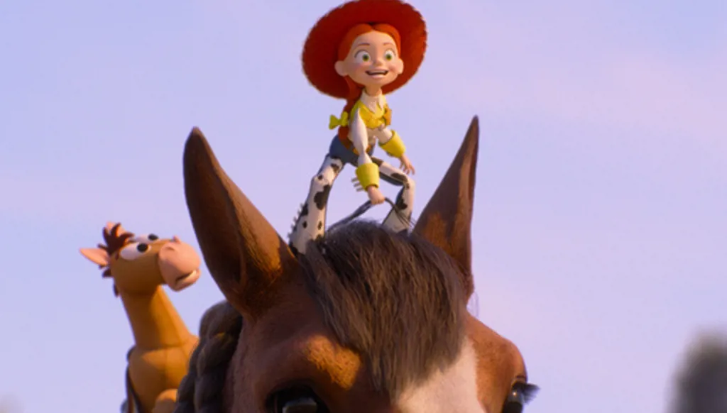 This image released by Pixar shows the characters Bullseye and Jessie, voiced by Joan Cusack, center, in a scene from "Toy Story 5." (Pixar-Disney via AP)