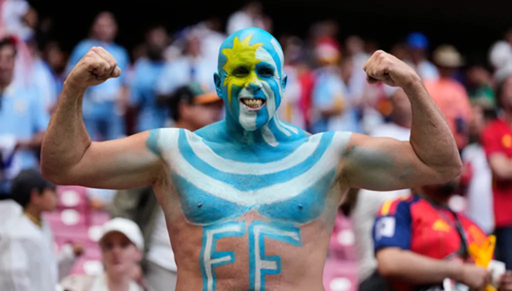 A fan of Uruguay poses prior to the World Cup Group H soccer match between Uruguay and Spain in Zapopan, near Guadalajara, Mexico, Friday, June 26, 2026. (AP Photo/Natacha Pisarenko)