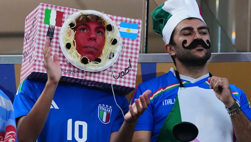 Spectators in costumes cheer ahead of the World Cup Group J soccer match between Jordan and Argentina in Arlington, Texas, near Dallas, Saturday, June 27, 2026. (AP Photo/Julio Cortez)
