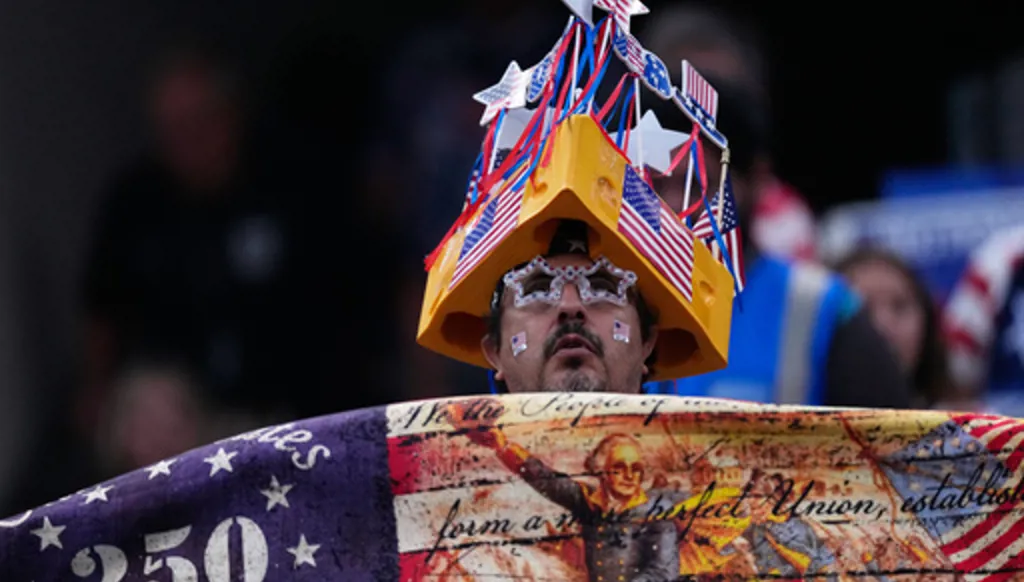 A fan of the United States waits for the start of a World Cup Group D soccer match between Turkey and the United States in Inglewood, Calif., near Los Angeles, Thursday, June 25, 2026. (AP Photo/Mark J. Terrill)