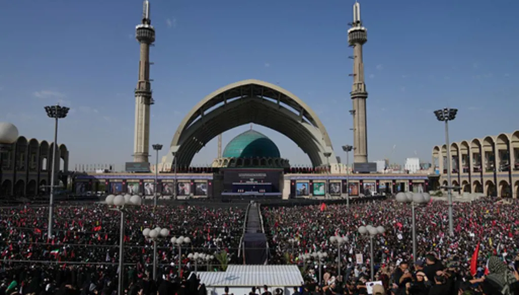 A crowd attends the start of the dayslong funeral ceremonies at the Imam Khomeini Mosalla Grand Mosque in Tehran, Iran, Saturday, July 4, 2026. (AP Photo/Altaf Qadri)