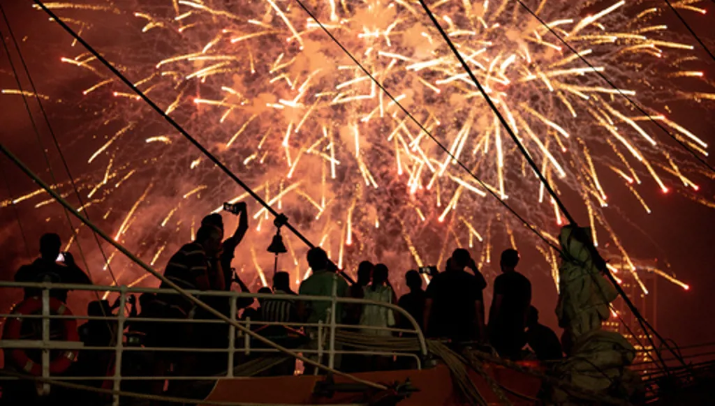 Crowds enjoy a fireworks show from Brooklyn Bridge Park in the Brooklyn borough of New York, Saturday, July 4, 2026. (AP Photo/Anna Connors)