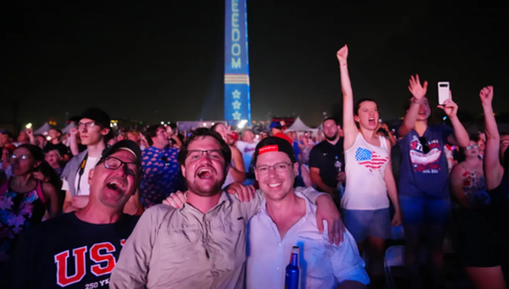 People listen as President Donald Trump speaks at Salute to America, an Independence Day event honoring the nation's 250th anniversary, Saturday, July 4, 2026, on the National Mall in Washington.(AP Photo/Julia Demaree Nikhinson)