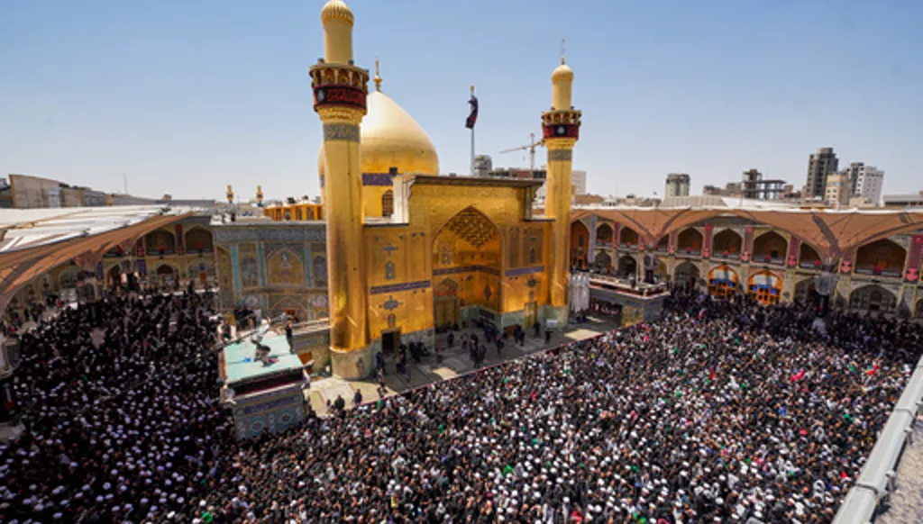 Mourners gather in prayer during the funeral procession for the late Iranian Supreme Leader Ayatollah Ali Khamenei inside the Imam Ali Shrine in Najaf, Iraq, Wednesday, July 8, 2026. (AP Photo/Anmar Khalil)