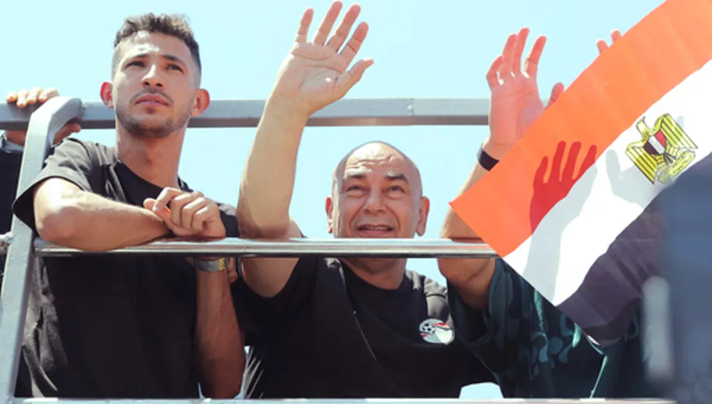 Egypt's Head coach Hossam Hassan greets fans upon the Egyptian national soccer team arrival at El-Alamein airport,160 km (99 miles) west of Alexandria, Egypt, Friday, July 10, 2026. (AP Photo)