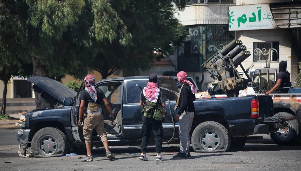 مقاتلون من البدو في السويداء. (ا ف ب)