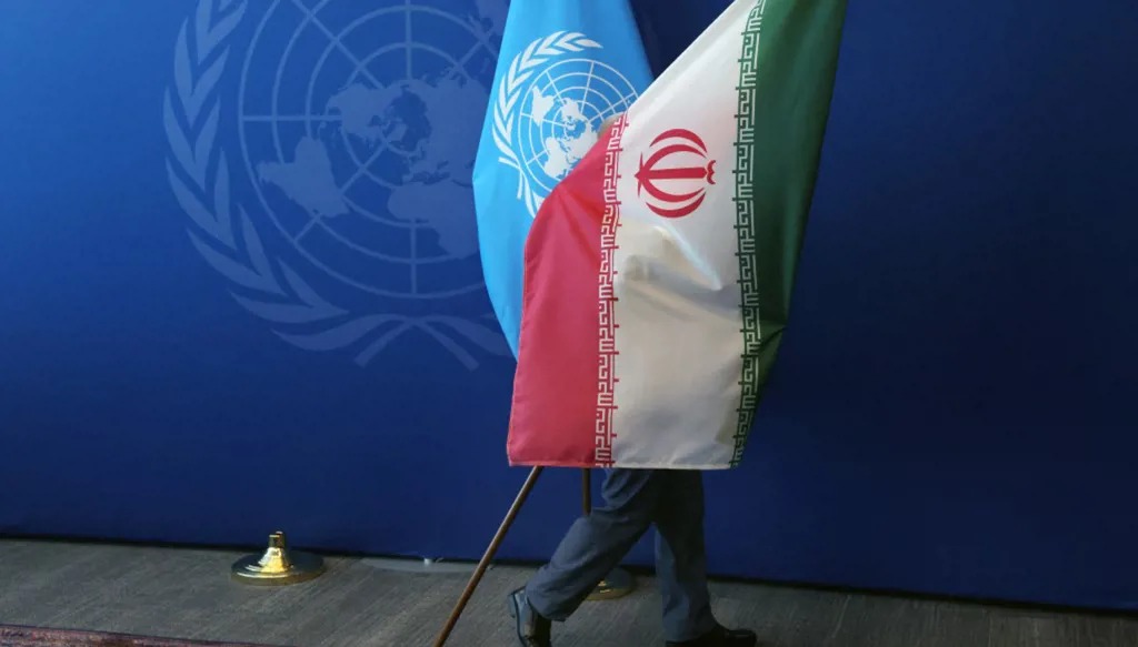علما إيران والأمم المتحدة (أ ف ب).