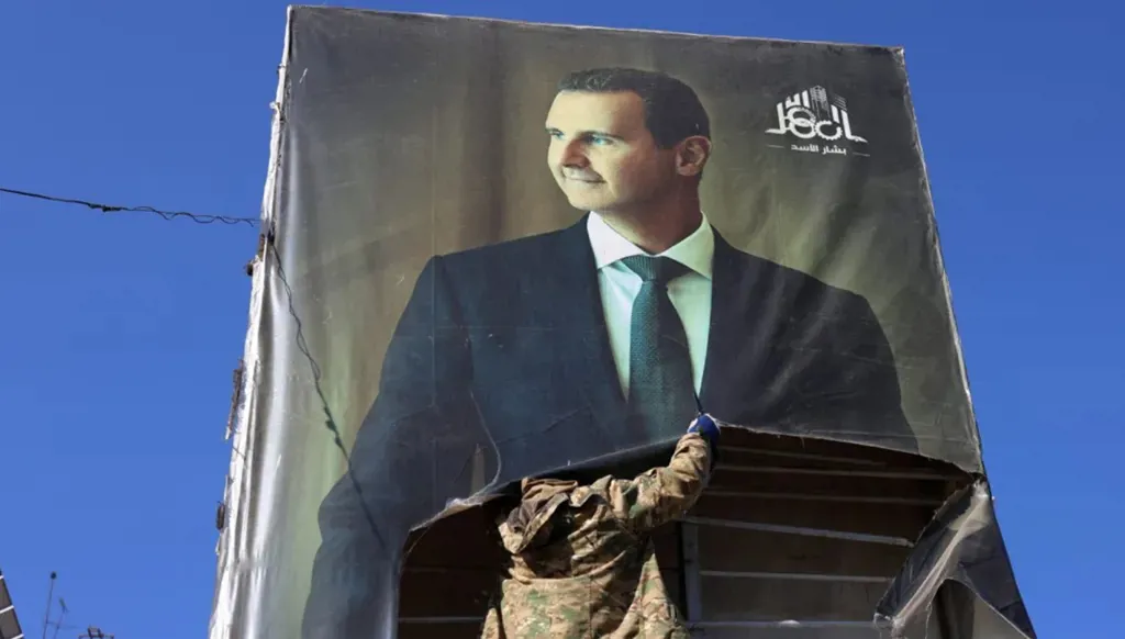 صورة لبشار الأسد في دمشق (أرشيفية، أ ف ب).