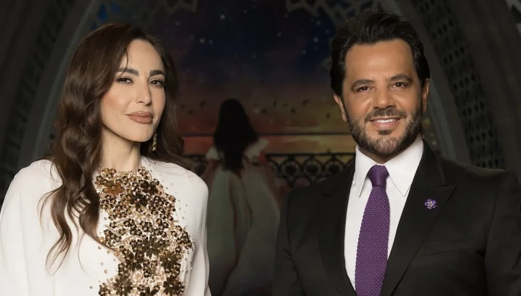 عبير نعمة تتألّق بتصميم نجا سعادة مع الإعلاميّ نيشان في برنامج أمير الشعراء (صور وفيديو)