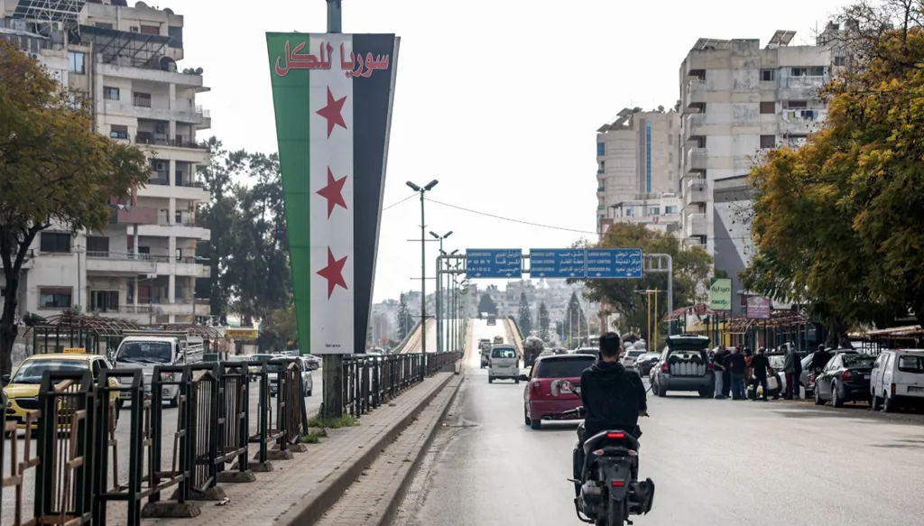 علم سوريا (أ ف ب).