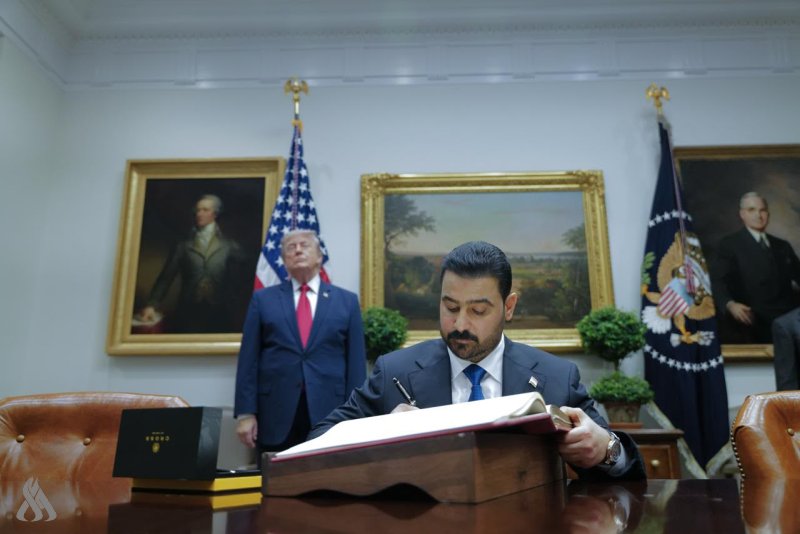 الزيدي وخلفه ترامب (واع)