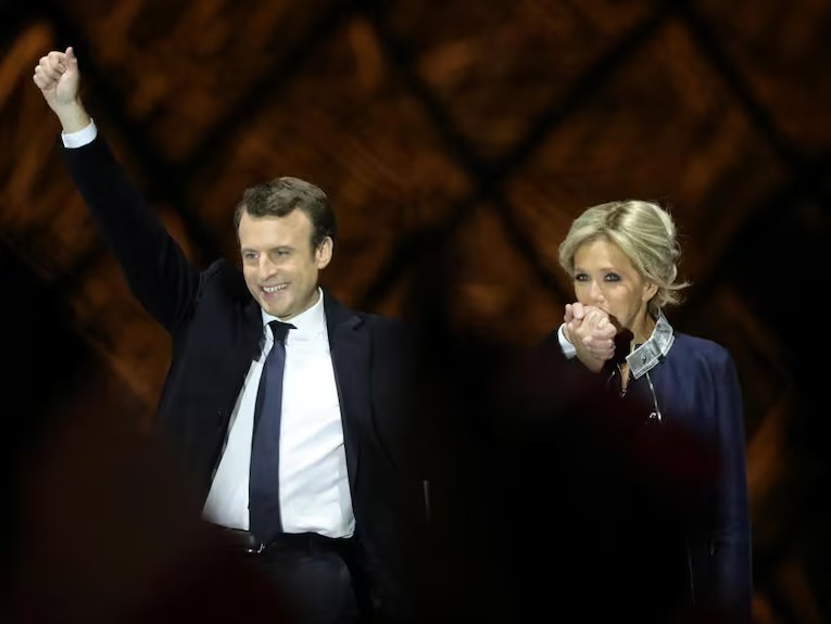 بريجيت وإيمانويل ماكرون (أ ف ب)