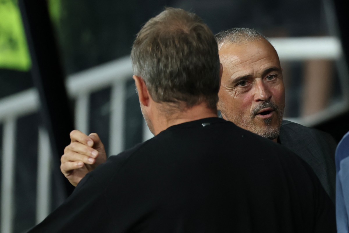 فليك وإنريكي. (أ ف ب) 