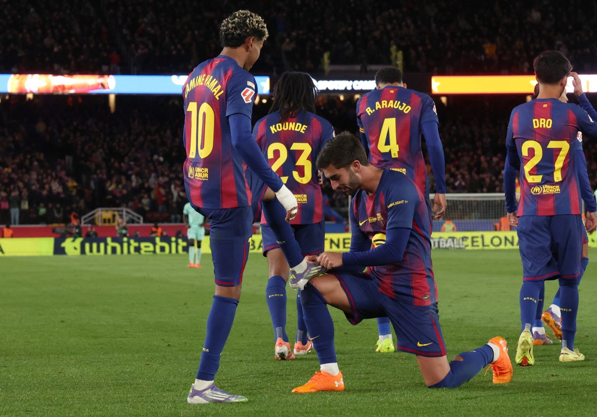 لاعبو برشلونة. (أ ف ب)