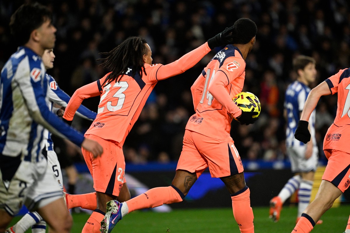 لاعبو برشلونة. (أ ف ب) 