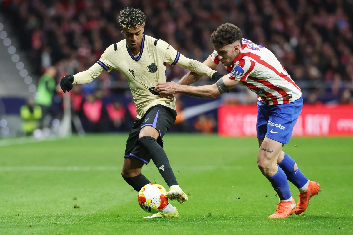 من مباراة برشلونة وأتلتيكو مدريد. (أ ف ب) 