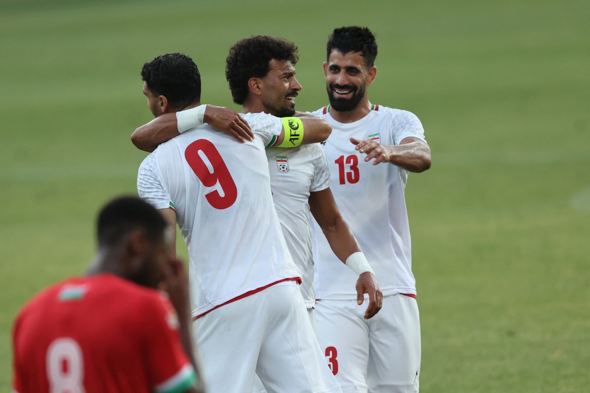 لاعبو إيران. (أ ف ب)