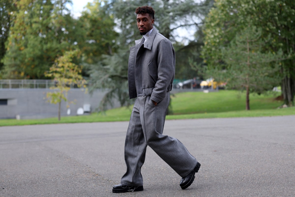 كومان خلال الانضمام لمعسكر فرنسا (أ ف ب)