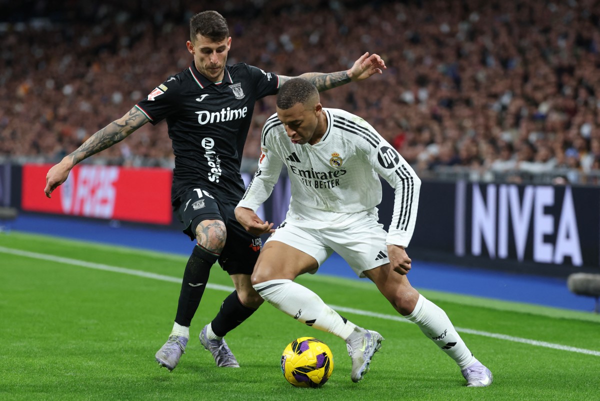 مبابي خلال لقاء ريال مدريد وليغانيس (أ ف ب)