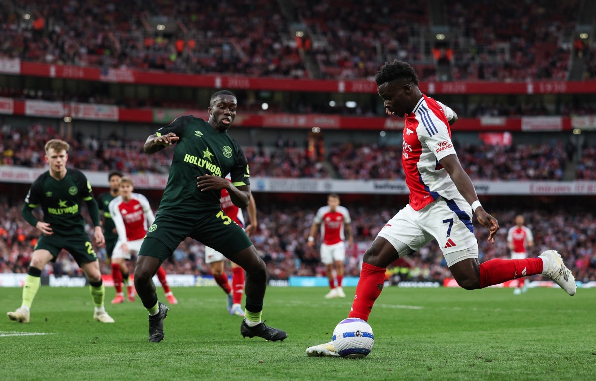 من لقاء أرسنال وبرينتفورد (أ ف ب)