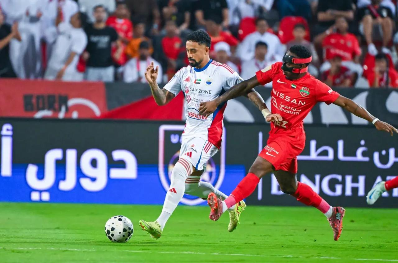 من لقاء شباب الأهلي والشارقة (وكالات)