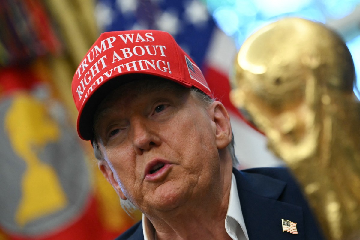 ترامب بالقبعة الحمراء (أ ف ب)