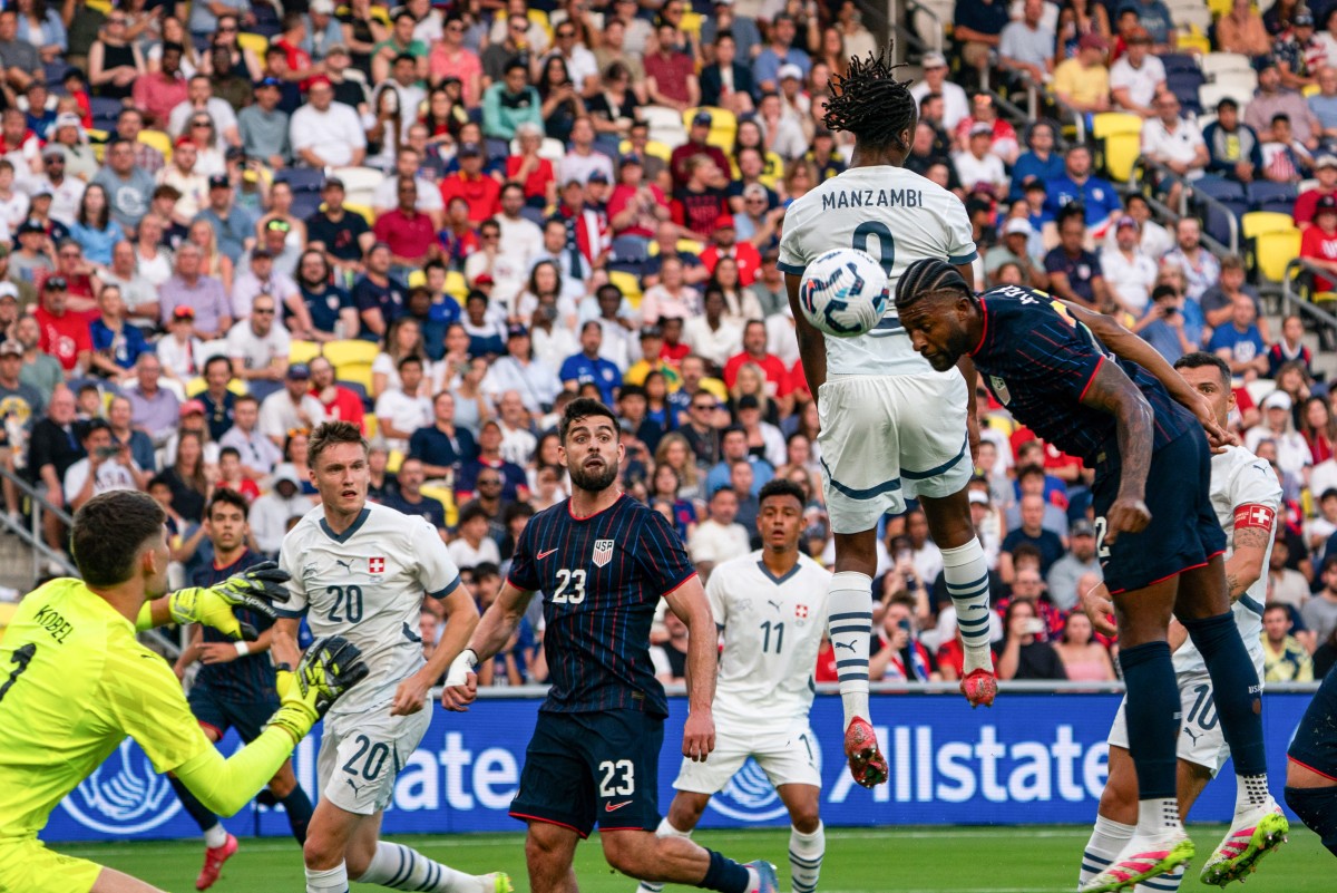 من لقاء أميركا وسويسرا (أ ف ب)