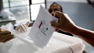 مشهد من الانتخابات النيابية لدورة 2018 (أ ف ب).