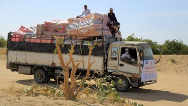 توزيع مساعدات في اليمن ( ا ف ب)