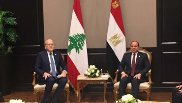 الرئيس المصري عبدالفتاح السيسي ورئيس مجلس الوزراء نجيب ميقاتي.