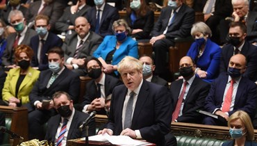 جونسون خلال جلسة مساءلة في مجلس العموم في لندن (12 ك2 2022، ا ف ب). 