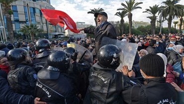 مشهد من احتفالات ذكرى ثورة 2011 في تونس (أ ف ب).
