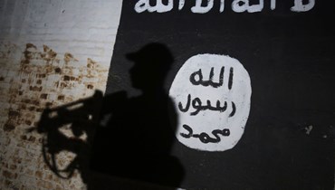 راية "تنظيم الدولة الإسلامية" (أ ف ب).