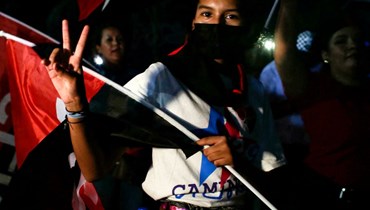 أنصار رئيس نيكاراغوا دانيال أورتيغا يحتفلون بإعادة انتخابه في ماناغوا (أ ف ب).