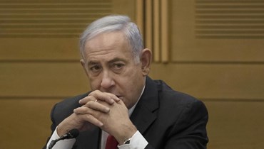 نتنياهو يتحدث إلى أعضاء أحزاب المعارضة اليمينية في الكنيست في القدس (14 حزيران 2021، أ ب). 