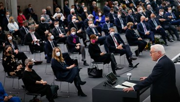 شتاينماير ملقيا كلمة امام الجمعية الفيدرالية الألمانية في برلين (13 شباط 2022، أ ف ب). 