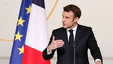 ماكرون خلال مؤتمر صحافي مشترك مع نظيريه الغاني والسنغالي ورئيس المجلس الأوروبي ميشال (ليسوا في الصورة) في قصر الإليزيه في باريس (17 شباط 2022، ا ف ب).